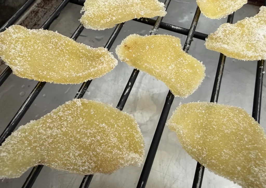 Crystalized Ginger drying on rack