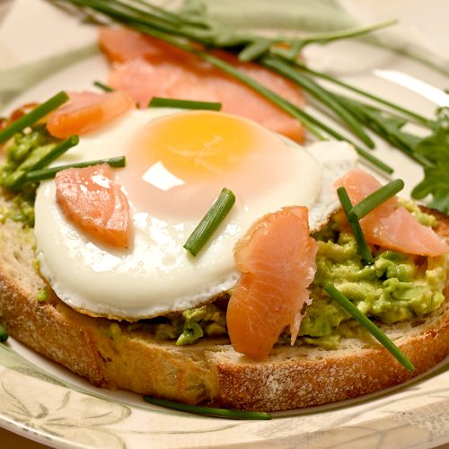 Avocado Toast with Egg, smoked salmon and spring greens