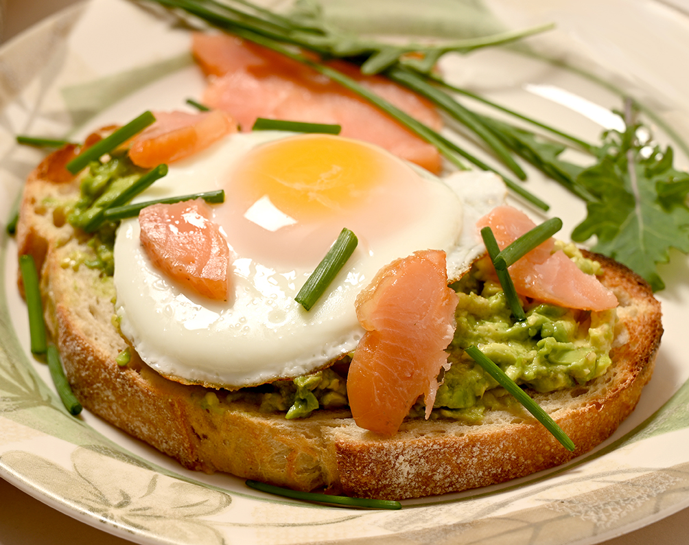 Avocado Toast with Egg, smoked salmon and spring greens